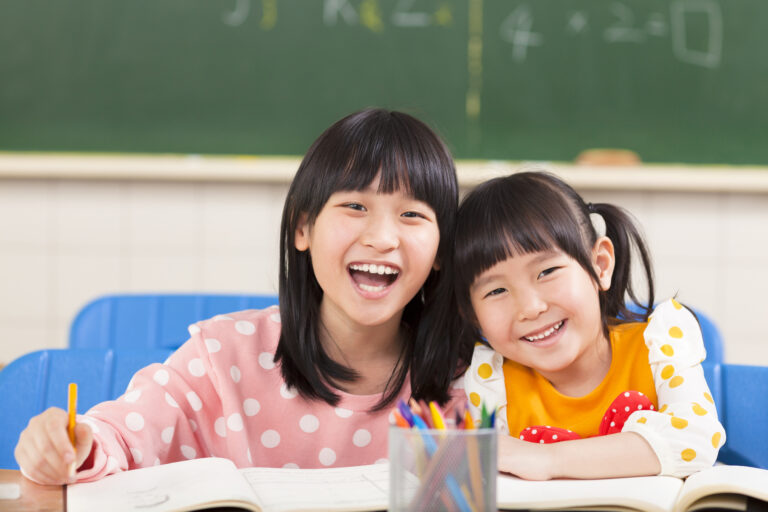 Happy,Little,Girls,In,The,Classroom
